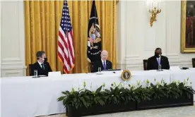  ??  ?? Joe Biden speaks during a cabinet meeting in the East Room of the White House as Antony Blinken, left, and Lloyd Austin, right, listen. Photograph: Evan Vucci/AP