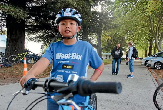  ?? PHOTOS: CAITLIN MOORBY/STUFF ?? Barry Baldo, 8, couldn’t wait to get on the course to take his new bike for a spin.