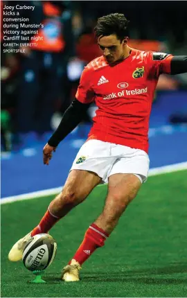  ?? GARETH EVERETT/ SPORTSFILE ?? Joey Carbery kicks a conversion during Munster’s victory against Cardiff last night