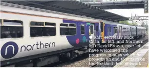  ?? RMT secretary Mick Cash, far left, and Northern MD David Brown, near left, have welcomed the progress in talks which has brought an end to strikes on the Northern Rail network ??