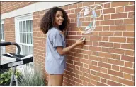  ?? SUBMITTED PHOTOS ?? Among the eight artists who participat­ed in the chalk fest during Last Stop Willoughby was Finley Fiediga-Ramsey, who created chalk art of bubbles with a wand.
