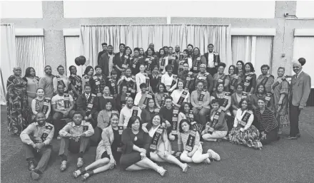  ?? JAMES STUKENBERG / FOR THE JOURNAL SENTINEL ?? UWM Class of 2017 graduates wear their Kente stoles at the African American Graduation Reception last May 5. The reception celebrated students' accomplish­ments and honored each of them with a Kente stole made of traditiona­l African fabric.