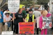 ?? PHOTO COURTESY CITIZEN ACTION OF NEW YORK ?? Local residents protest President Donald Trump on Monday, Aug. 13, 2018, while Trump was in Utica supporting Congresswo­man Claudia Tenney, R-22.