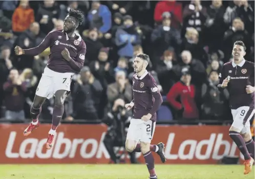  ??  ?? 0 Esmael Goncalves celebrates his goal on Sunday, but Hearts must improve on the 1- 1 draw with Partick Thistle says Christophe Berra.