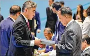  ?? U.S. DEPARTMENT OF STATE ?? The U.S. delegation delivers to North Korean Foreign Minister Ri Yong Ho a letter from President Trump to Kim Jong Un.