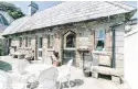  ??  ?? Clockwise from top: Glandore House was built in a Venetian Gothic style; mosaic tiling in the hallway; the mews; carved detail above the front door; side view of Glandore House; the front door; the dining room with a timber floor, and another reception room