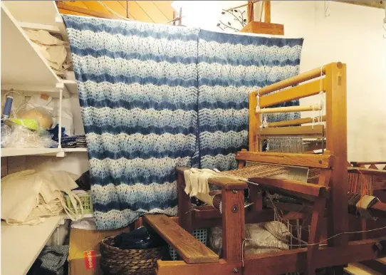  ?? PHOTOS: LINDA LOMBARDI/THE ASSOCIATED PRESS ?? A loom and indigo dyed fabric at Wanariya workshop in Tokyo. Indigo is the dye used in blue jeans.