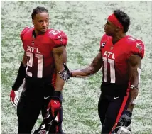  ?? CURTIS COMPTON/ CURTIS. COMPTON@ AJC. COM fifield ?? Todd Gurley ( left) and Julio Jones confer as they leave the after Sunday’s last- minute loss to the Lions. “You don’twant players or fans saying, ‘ Oh, the Falcons have done it again,’ ” Gurley said Monday.