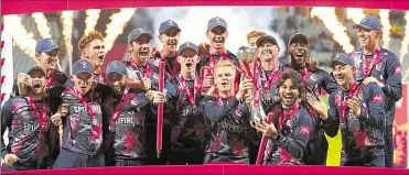  ?? Picture: Mike Egerton/pa Wire ?? Kent Spitfires captain Sam Billings and team-mates celebrate with the trophy after victory over Somerset in the T20 Blast final at Edgbaston