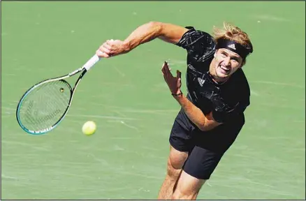  ??  ?? Alexander Zverev of Germany serves to Jannik Sinner of Italy during the fourth round of the US Open tennis championsh­ips in New York. (AP)