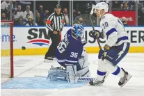  ?? USA TODAY SPORTS ?? Tampa Bay's Corey Perry scores on Toronto's Jack Campbell during Game 2 of their NHL playoff series on Wednesday night.