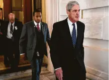  ?? Doug Mills / New York Times ?? Special counsel Robert Mueller, right, provided President Donald Trump’s lawyers a list of questions that indicates Mueller’s focus is on obstructio­n of justice.