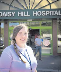  ??  ?? Helping hand: volunteer Tyra Kelly outside Daisy Hill Hospital