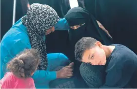  ?? ?? Palestinia­ns mourn relatives killed in Israeli bombardmen­t, at the al-Najjar hospital in Rafah in the southern Gaza Strip, yesterday. PHOTO: MOHAMMED ABED/AFP