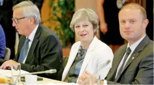  ?? Reuters ?? European Commission President Jean-Claude Juncker, British Prime Minister Theresa May and Maltese Prime Minister Joseph Muscat at the EU summit in Brussels on Friday. —