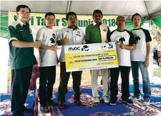  ??  ?? MUOC donated RM4,000 to the Sg Dusun Malayan Tapir Conservati­on Centre on World Tapir Day in April this year.