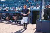  ?? CHARLIE NEIBERGALL/AP ?? Yankees shortstop Anthony Volpe walks to the field during a spring training workout Feb. 21 in Tampa, Florida.