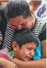  ?? Getty Images ?? Relatives bury earthquake victims in Juchitan, Mexico.