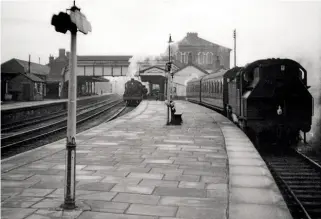  ??  ?? When the LMR took over Western region lines in the Midlands and central Wales at the beginning of 1963, it moved quickly to replace the former GWR engines. An example was at Oswestry, where two Standard ‘2MT’ tanks –
Nos. 84000 and 84004 – and LMR push-pull sets, replaced the former GWR auto-tanks and coaches. Here, No. 84004 waits to leave Oswestry with the 2.58pm for Gobowen on January 4, 1964.