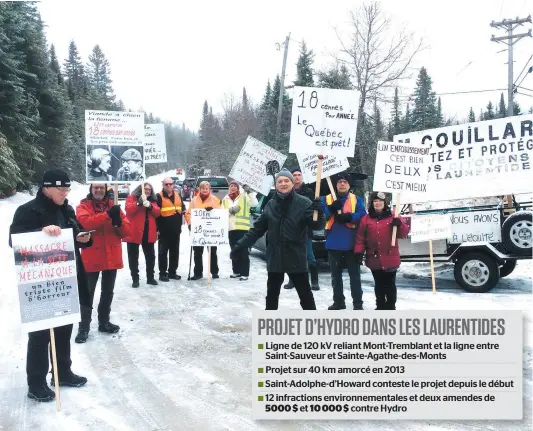  ?? PHOTO COURTOISIE, DENISE PAYETTE ?? Les résidents de Saint-Adolphe-d’Howard dans les Laurentide­s ont manifesté en mars dernier et entendent poursuivre leur bataille contre la ligne à haute tension d’Hydro-Québec, qui traversera leur territoire, entre Grand-Brûlé et Saint-Sauveur.