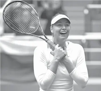  ?? FRANCE PRESSE
AGENCE ?? Maria Sharapova of Russia reacts after winning her women's singles final match against Aryna Sabalenka of Belarus at the Tianjin Open tennis tournament in Tianjin.