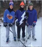  ?? PAUL POST — THE SARATOGIAN ?? Zachary Baker, Sean Holmes and Nicholas McDonough, left to right, went to Saratoga Springs High School and maintain friendship­s with regular games of pond hockey.