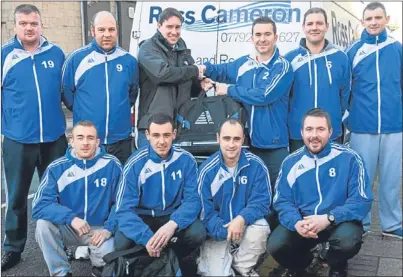  ?? Picture: Fraser Band. ?? Perth United has received new training bags from sponsor Ross Cameron, back, centre left, who is pictured with some of the squad members and player/coach Gary McColl.