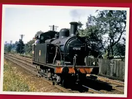  ??  ?? Ex-works ‘Jinty’ No. 47502 drops down the Lickey Incline, about 250 yards behind a southbound freight, in July 1956. Permissive working like this saved southbound paths. COLOUR‑RAIL