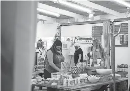  ??  ?? Customers file in and out of the vendors’ booths at the Merchantil­e.