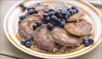  ?? | AP PHOTO ?? Lemon syrniki is a farm-style cheese pancake, sort of a cross between cheesecake and pancakes.