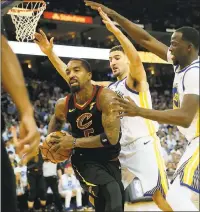  ?? JANE TYSKA — STAFF ARCHIVES ?? Klay Thompson, center, and Draymond Green double-team the Cavs’ JR Smith recently. A close look at Thompson’s first-half stats goes a long way toward explaining Golden’s State’s 33-9record.