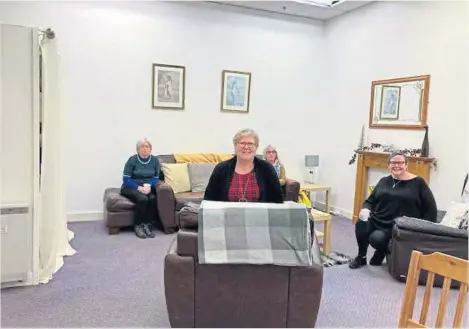  ??  ?? Debbie Findlay and some other friendly faces in the newly-opened drop-in centre at the Wellgate.