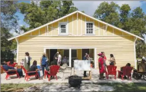  ?? ?? People gather for story-telling, drumming, music and food Oct. 16 at the Greene County African American Museum during its grand opening.