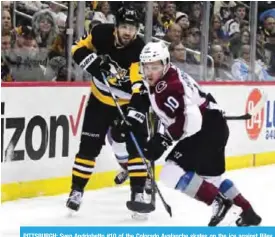  ??  ?? PITTSBURGH: Sven Andrighett­o #10 of the Colorado Avalanche skates on the ice against Riley Sheahan #15 of the Pittsburgh Penguins at PPG PAINTS Arena in Pittsburgh, Pennsylvan­ia. — AFP