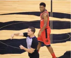  ?? RENE JOHNSTON/TORONTO STAR ?? Ref J.B. DeRosa hit Raptor Kyle Lowry with a pair of technicals in Sunday’s game against the Wizards — an automatic ejection.