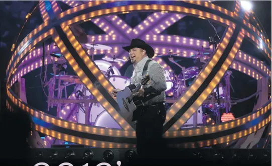  ?? TONY CALDWELL ?? Country singer Garth Brooks performs at the Canadian Tire Centre in April. Brooks and his wife Trisha Yearwood played four sold-out shows in three days.