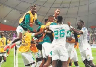  ?? // REUTERS ?? Los jugadores de Senegal, felices por su clasificac­ión