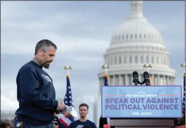  ?? SUSAN WALSH / ASSOCIATED PRESS FILE ?? Former Metropolit­an Police Officer Michael Fanone, who helped defend the U.S. Capitol during the Jan. 6 attack two years ago, takes the stage Jan. 5 to speak at a rally in Washington.