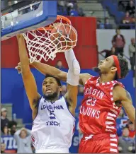  ?? Louisiana Tech Sports Informatio­n ?? White ends career: Louisiana Tech's Joniah White jams home a basket during a game in Ruston, La. White announced Tuesday that he is ending his basketball career due to health issues.