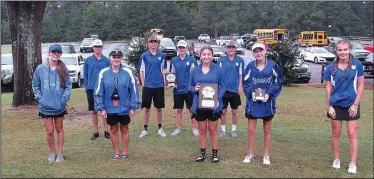  ?? Contribute­d photo ?? Lady Trojans win: Parkers Chapel's girls and boys golf teams celebrate after their 2A-6 Tournament on Monday at the Lion's Club. The Lady Trojans won the championsh­ip with the Trojans taking second.