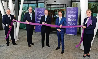  ?? ?? > From left, Flybe director of flight operations Mark Firth, Birmingham Airport chief executive Nick Barton, Flybe chief executive David Pflieger, West Midlands Mayor Andy Street and and head of air crew Cindy Lewis