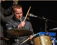  ?? Squadronai­res ?? Sgt Matt Walker plays drums with the