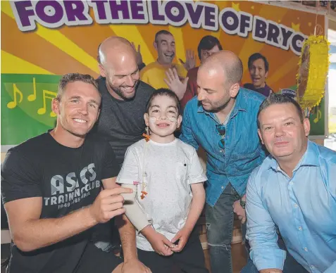  ?? Picture: JAY TOWN ?? MATES: Bryce McKiernan at his giant party earlier this year with Geelong captain Joel Selwood, left, Cats great Paul Chapman and MasterChef stars George Calombaris and Gary Mehigan.