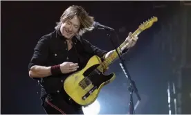  ??  ?? Totally convincing ... Keith Urban performs at C2C. Photograph: Jo Hale/Redferns