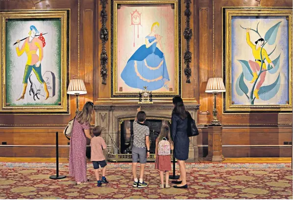 ??  ?? Portraits are getting a spring clean at the royal palaces ahead of them being reopened to the public. At Windsor Castle, ‘pantomime pictures’ behind Sir Thomas Lawrence portraits are on show, too