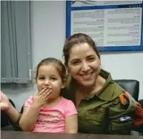  ?? (IDF) ?? COL. DR. Olga Polyakov and her daughter (left) and Maj.Gen. Merav Shavi-Sultan, serve in the Home Front Command.