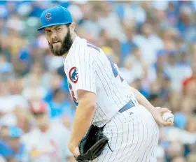  ??  ?? Jake Arrieta, de Chicago, se apuntó su decimoctav­o triunfo de la campaña al ponchar a 10 y ceder cinco indiscutib­les en siete entradas.