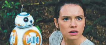  ??  ?? ACTION WOMAN: Rey and droid BB-8 in a scene from
Star Wars: The Force Awakens.