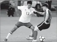  ?? Photo courtesy of JBU Sports Informatio­n ?? John Brown University’s Steve Teshima goes up against a Science and Arts (Okla.) player during Tuesday’s match in Chickasha, Okla.