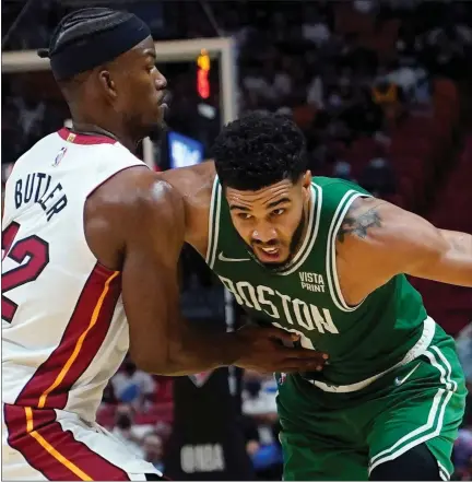  ?? AP FILE ?? Jimmy Butler of the Heat against the Jayson Tatum is just one of a number of interestin­g matchups in the Eastern Conference finals.